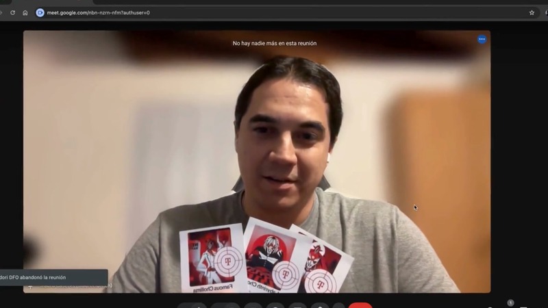 Chollima I - Bitso team member holding target stickers